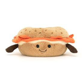 Jellycat Amuseables Bagel Plush side view shows compact cuddliness for desk companions