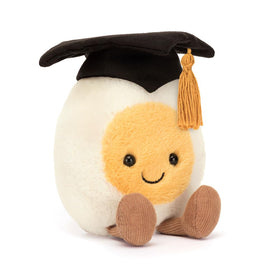 Jellycat Amuseables Boiled Egg Graduate with cream fur; a soft keepsake.