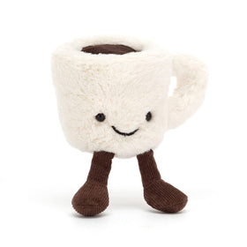 Jellycat Amuseables Espresso Cup height comparison beside hand for scale.