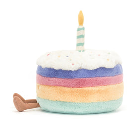 Close-up of Jellycat Rainbow Birthday Cake icing detail for vibrant party vibe.