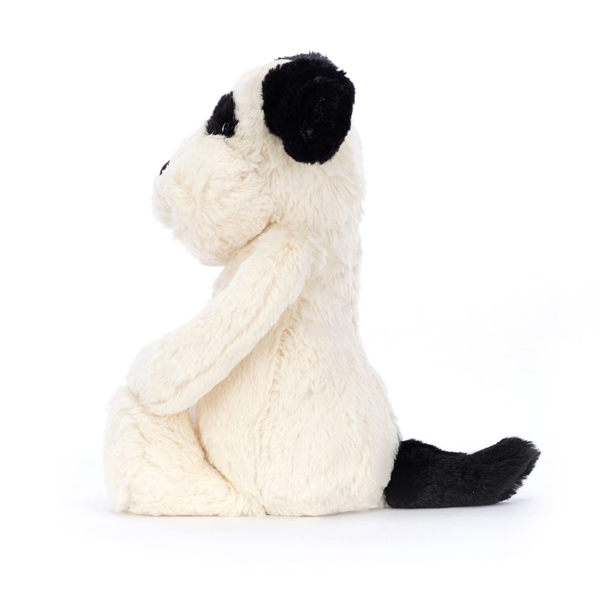 Jellycat Bashful Black & Cream Puppy in a sitting pose for play