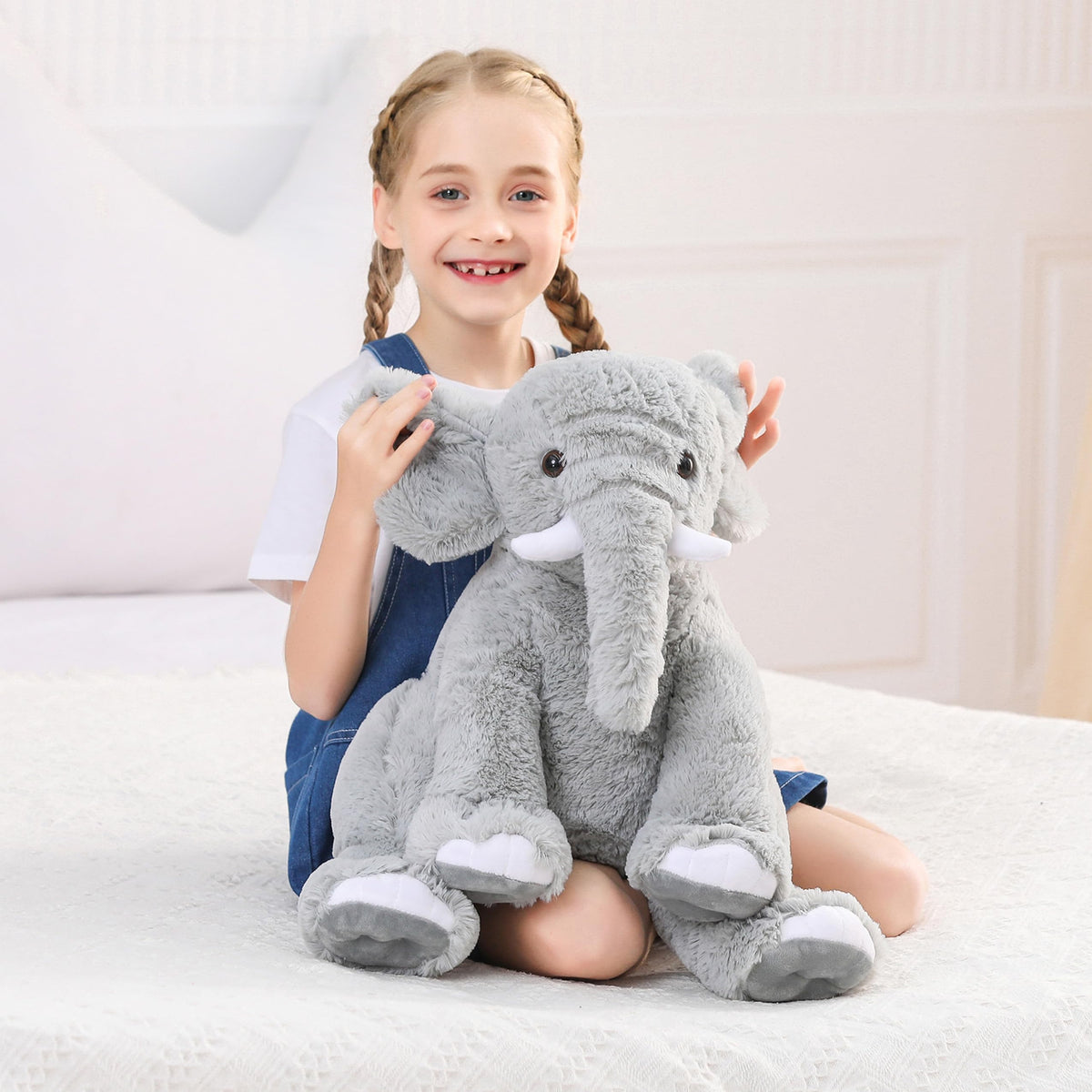 JellyMallow Elephant Weighted Plush Pillow, back view, soft polyester shell for cozy hugs.