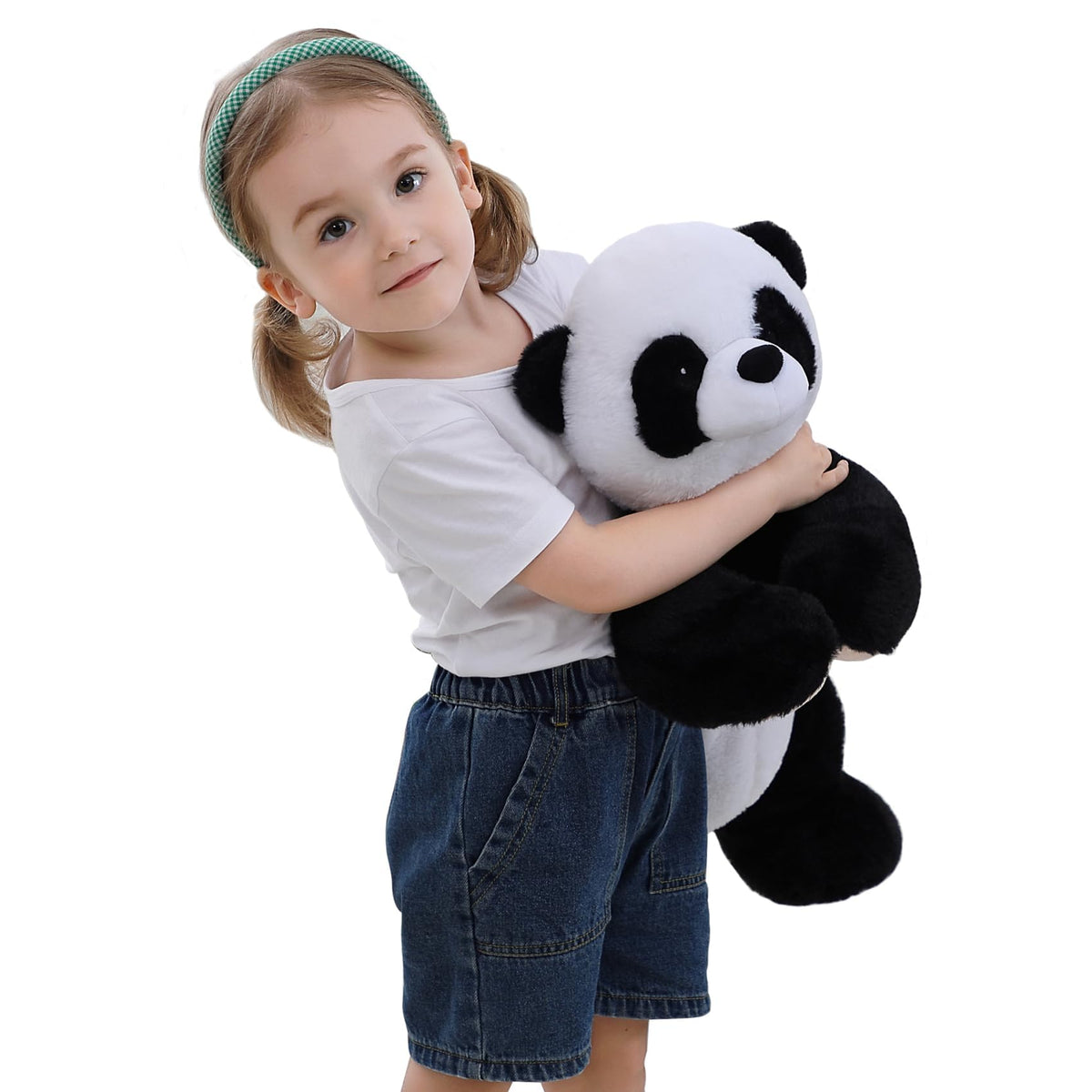 Huggable giant panda plush doubles as a soft bedtime pillow.