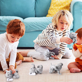 Kids sharing and cuddling Jenaai elephants during playtime
