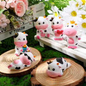Jenaai six-styles rainbow cow toys provide colorful variety.