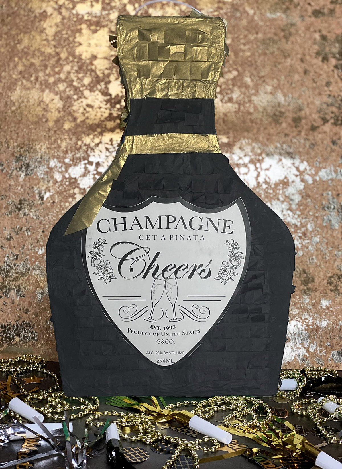 Jergrim Champagne Piñata filled with party favors for celebrations.