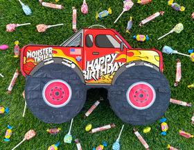 Jergrim Monster Truck Pinata opened set, shows how treats are accessed during the party.
