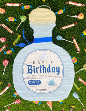 Jergrim Piñata Tequila bottle close-up, bright tissue paper and craftsmanship.