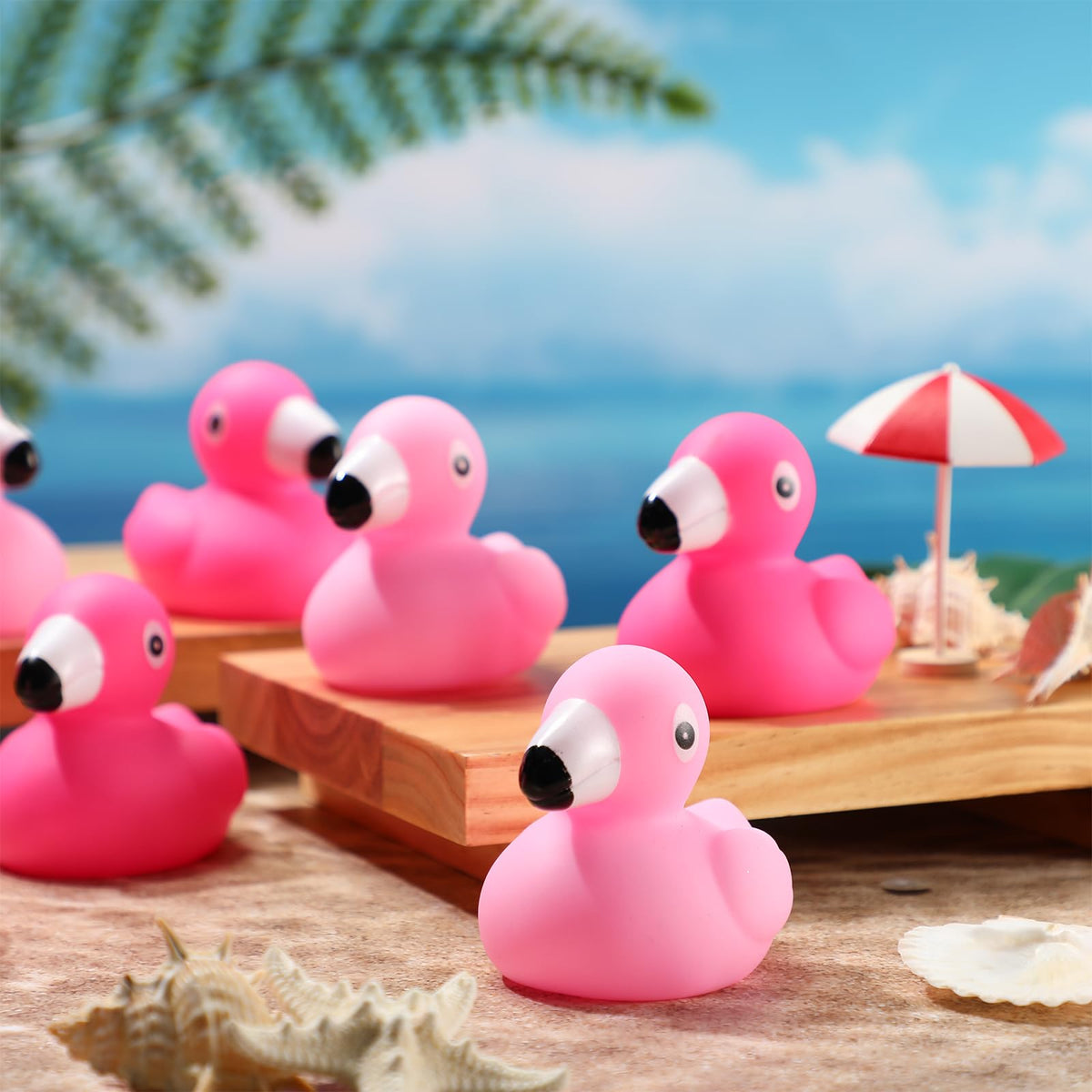 Jerify flamingo rubber duck used as party decor or cake topper