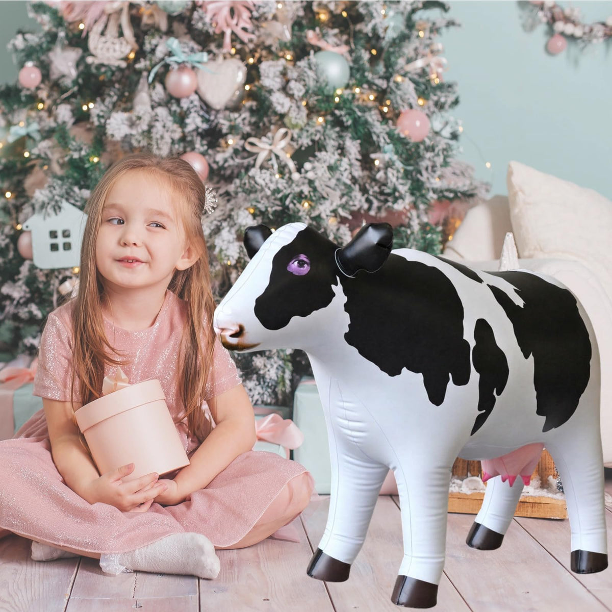 Jet Creations cow inflatable ideal for cute decor during children's parties.