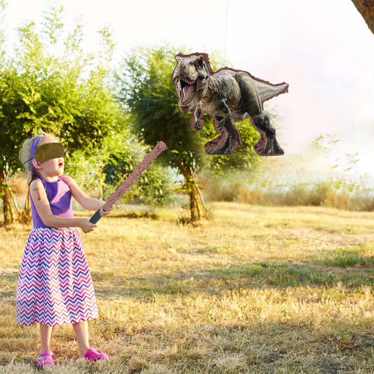 JOARHONAL dinosaur pinata filled with candies and small toys.