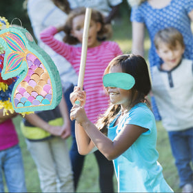 JOARHONAL Mermaid Tail Pinata party decor doubles as a centerpiece and activity.