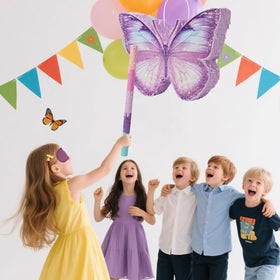 JOCOPUERTO butterfly pinata enhances birthday party ambiance.