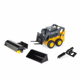 John Deere 318G skid steer with bucket for scooping tasks during outdoor play.