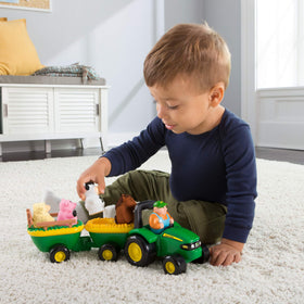 John Deere Animal Sounds Hayride farmer figure supports storytelling and interactive farm play.