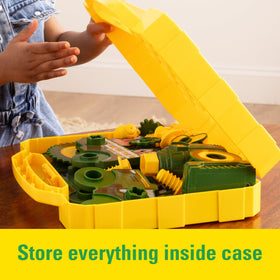 John Deere Build-A-Buddy board tractor-build scene encourages fine motor skills.