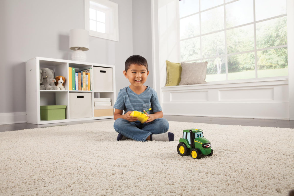 Durable John Deere Johnny Tractor RC toy handles bumps during play.