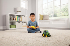 Durable John Deere Johnny Tractor RC toy handles bumps during play.