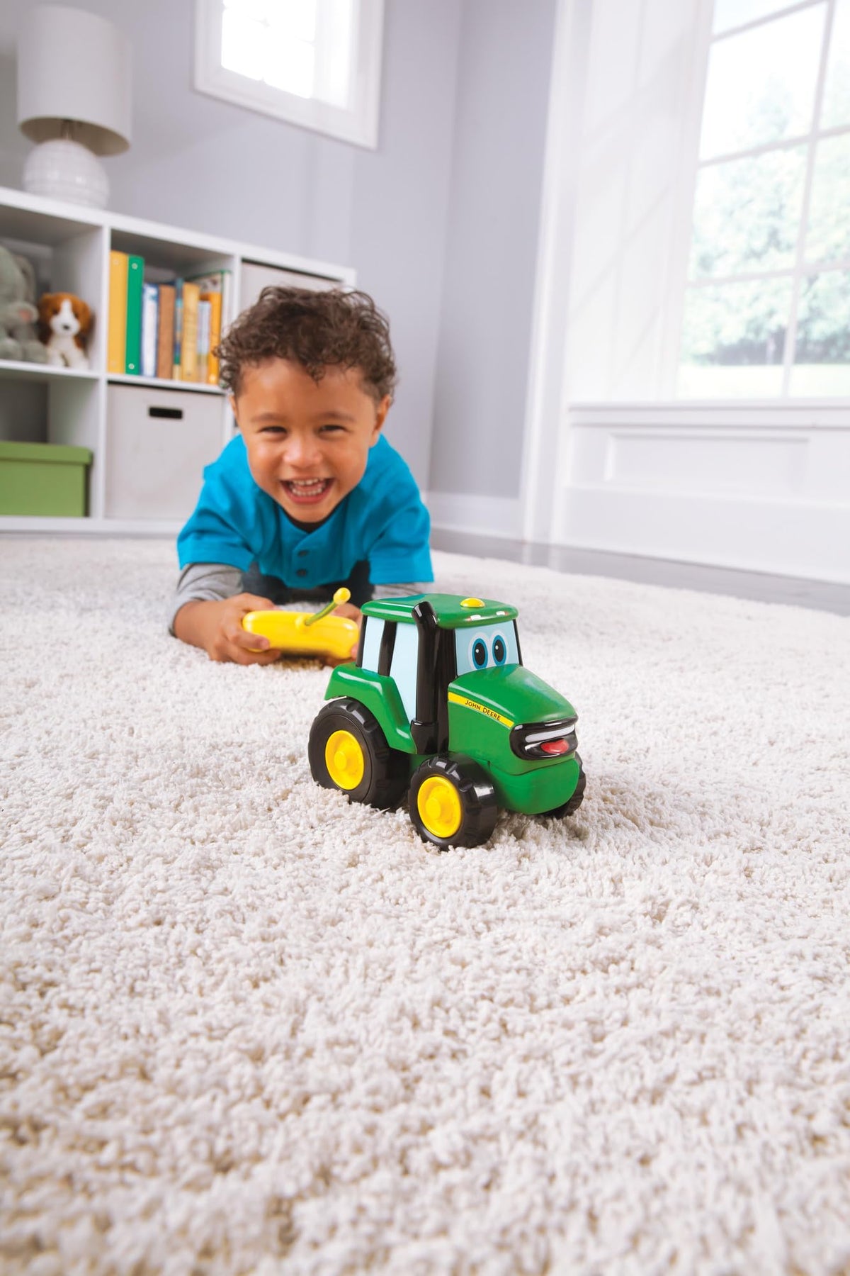 John Deere Johnny Tractor RC with simple two-button controller for easy use.
