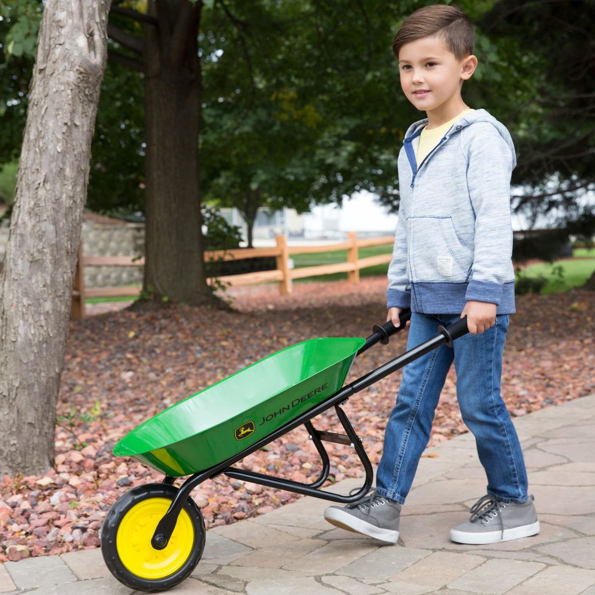 John Deere kids wheelbarrow rounded safety edges help prevent injuries during activities.