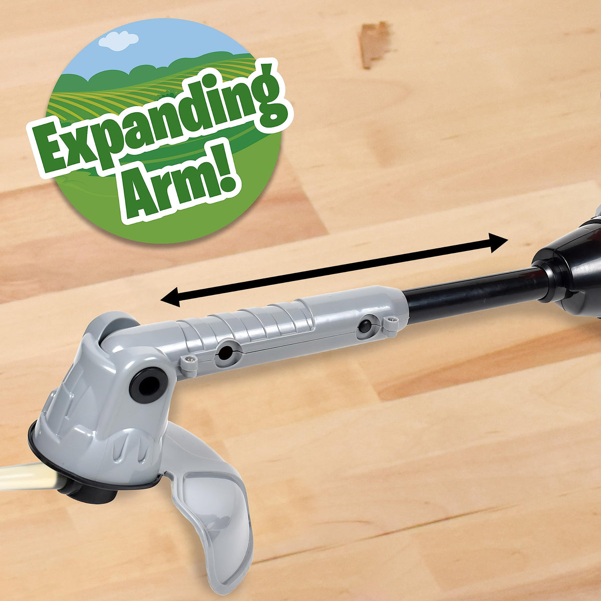 John Deere weed trimmer expanding arm enhances reach during backyard pretend tasks