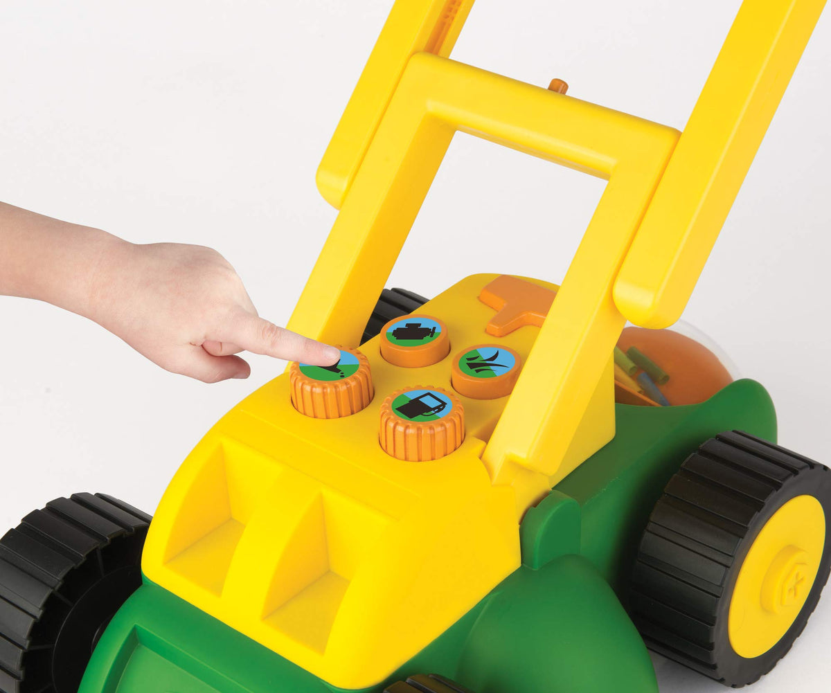 John Deere Tomy lawn mower side view with compact toddler-friendly design.