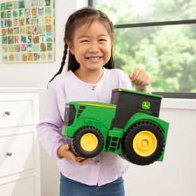 Vehicles and wagons from the John Deere toy collection ready to play.