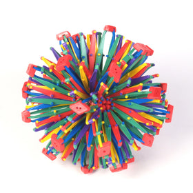 Rainbow colored Hoberman Sphere links offering bright visual appeal.