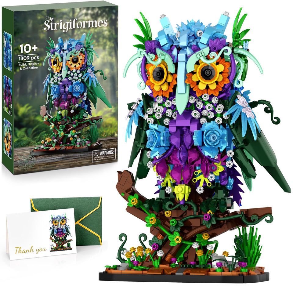 JOJO&Peach floral owl on a branch with vibrant wildflowers for display.