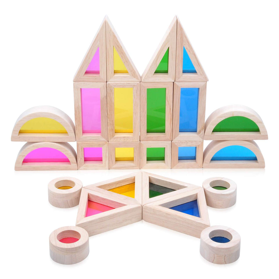 JOLKID wooden blocks with rainbow windows creating a colorful light display.