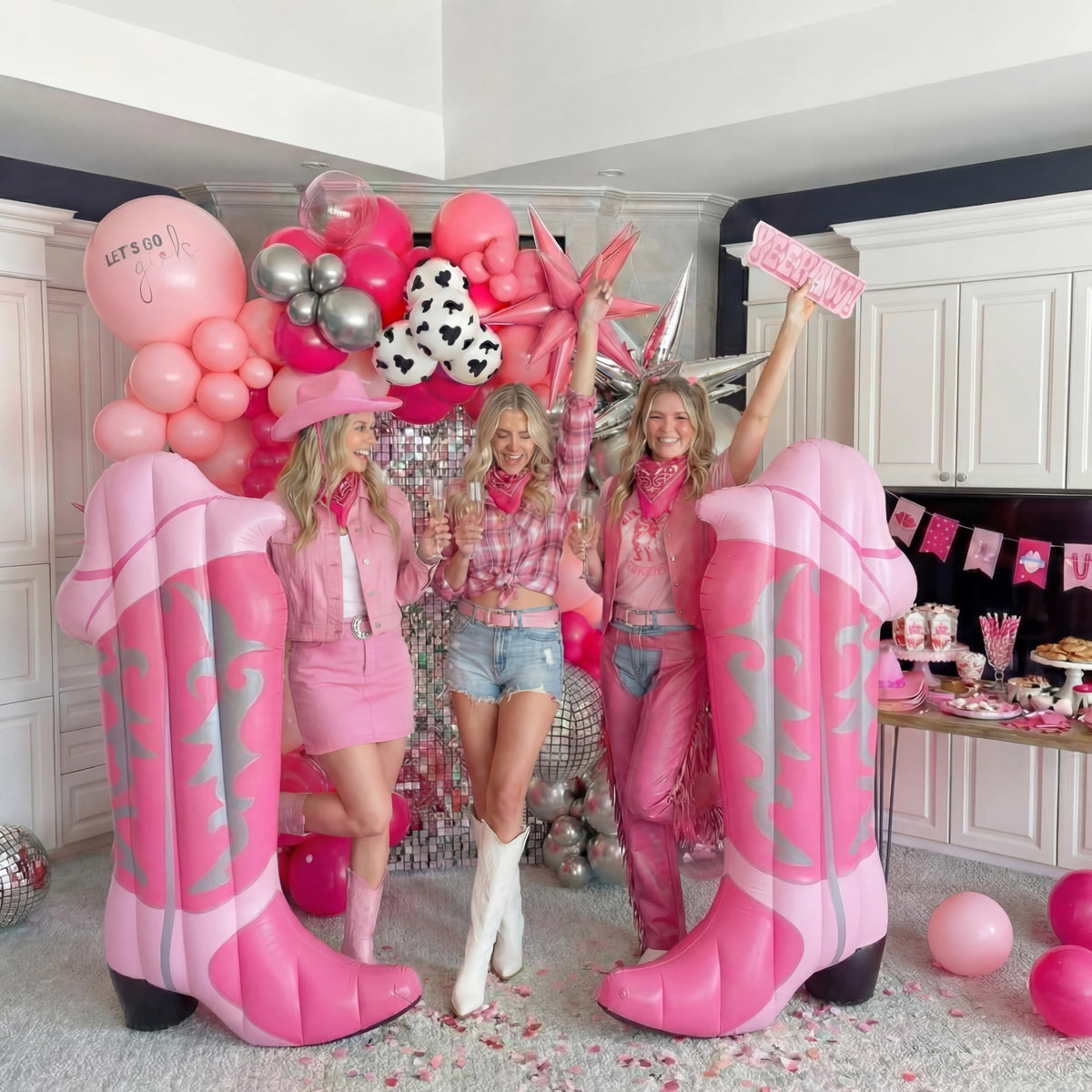 JolliLudo pink cowgirl boot pool float, festive decor for western-themed parties.