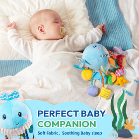 Jollybaby Ocean Whale toy rattles during playful movement for auditory stimulation.