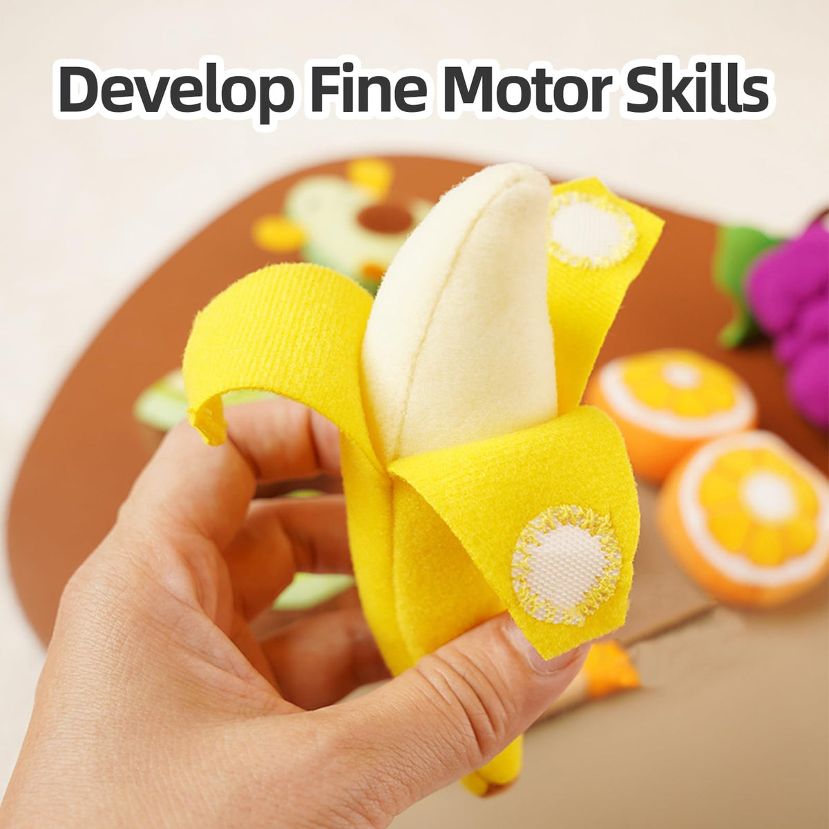 Jollybaby orange plush encourages sensory exploration during kitchen pretend play