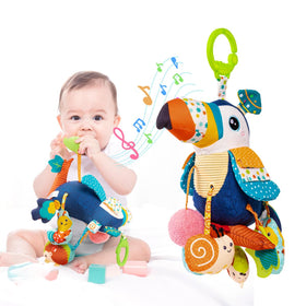 Jollybaby Toucan musical hanging toy on a stroller offers visual tracking and soothing sound.