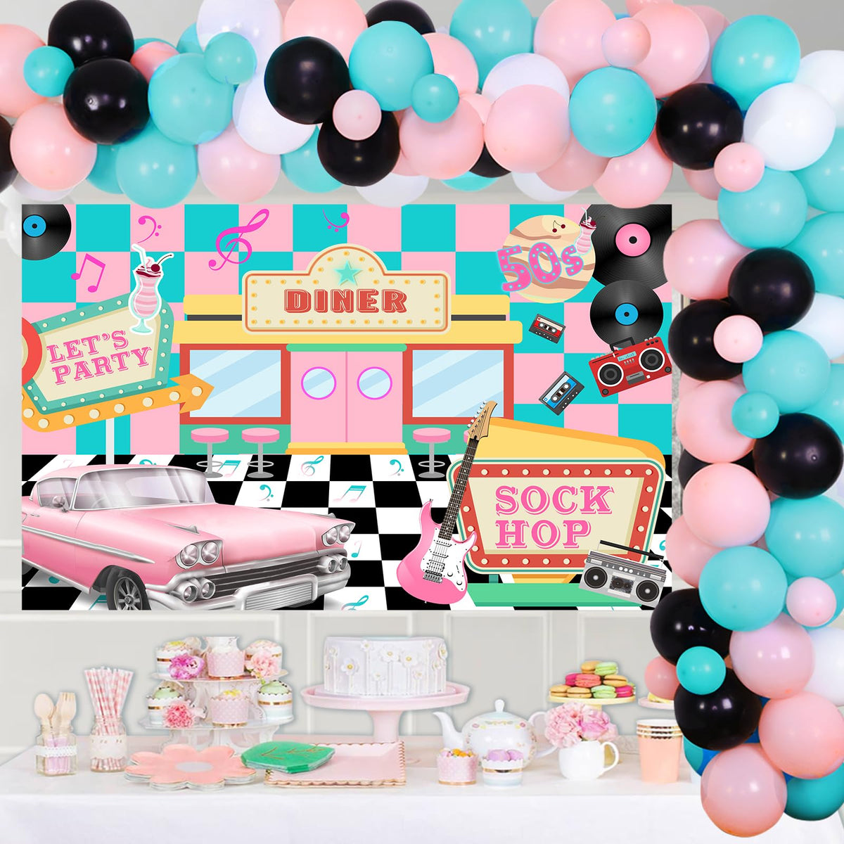 Jollyboom balloon arch sock hop entrance with retro vibe