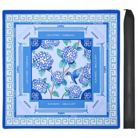 Jongyance blue Mahjong mat on a square table ready for play with clear surface and blue design