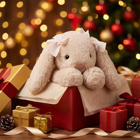 Jorkei Bunny plush beige as a cute home décor on a couch
