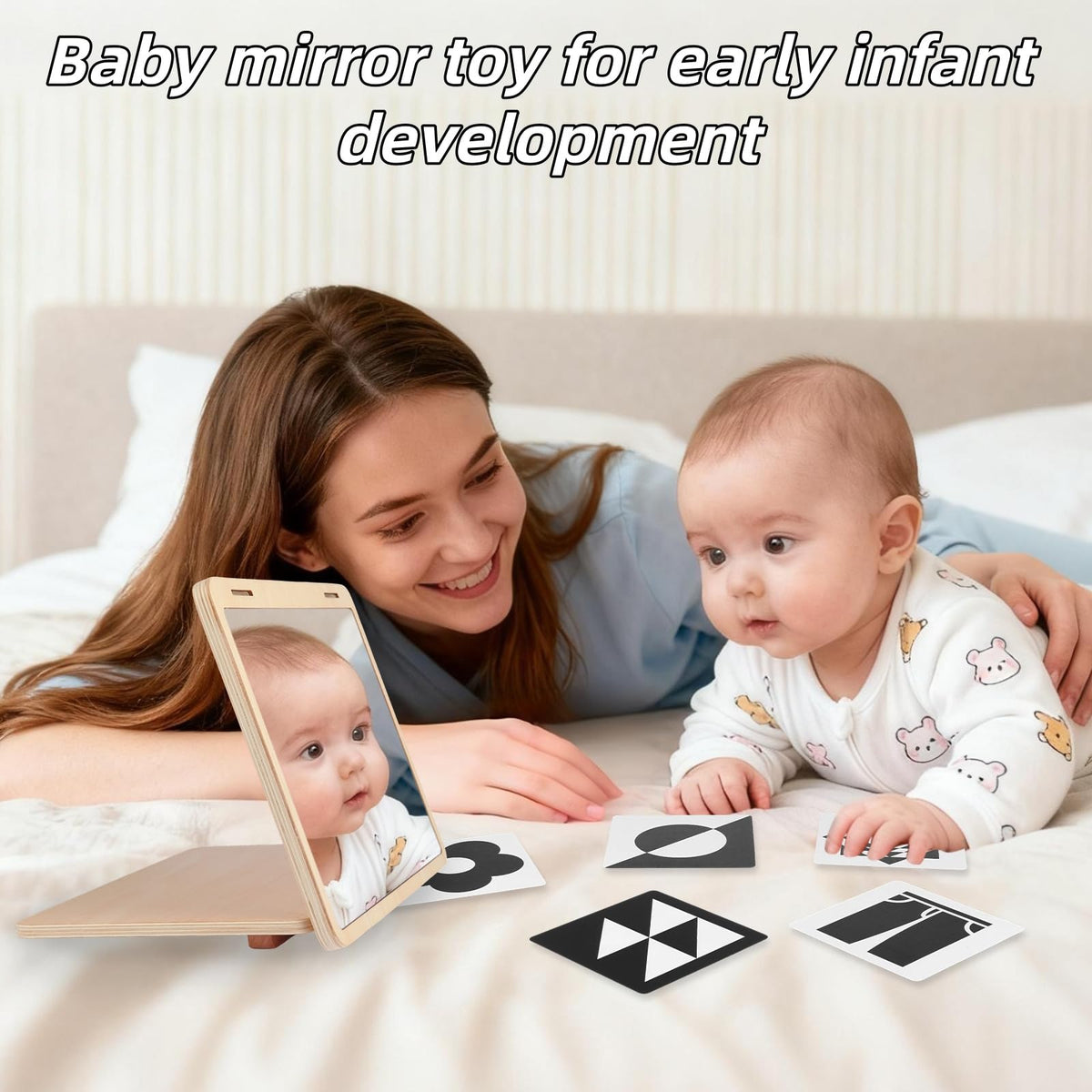 Juhg tummy time mirror shows 20 black-and-white cards for early focus.