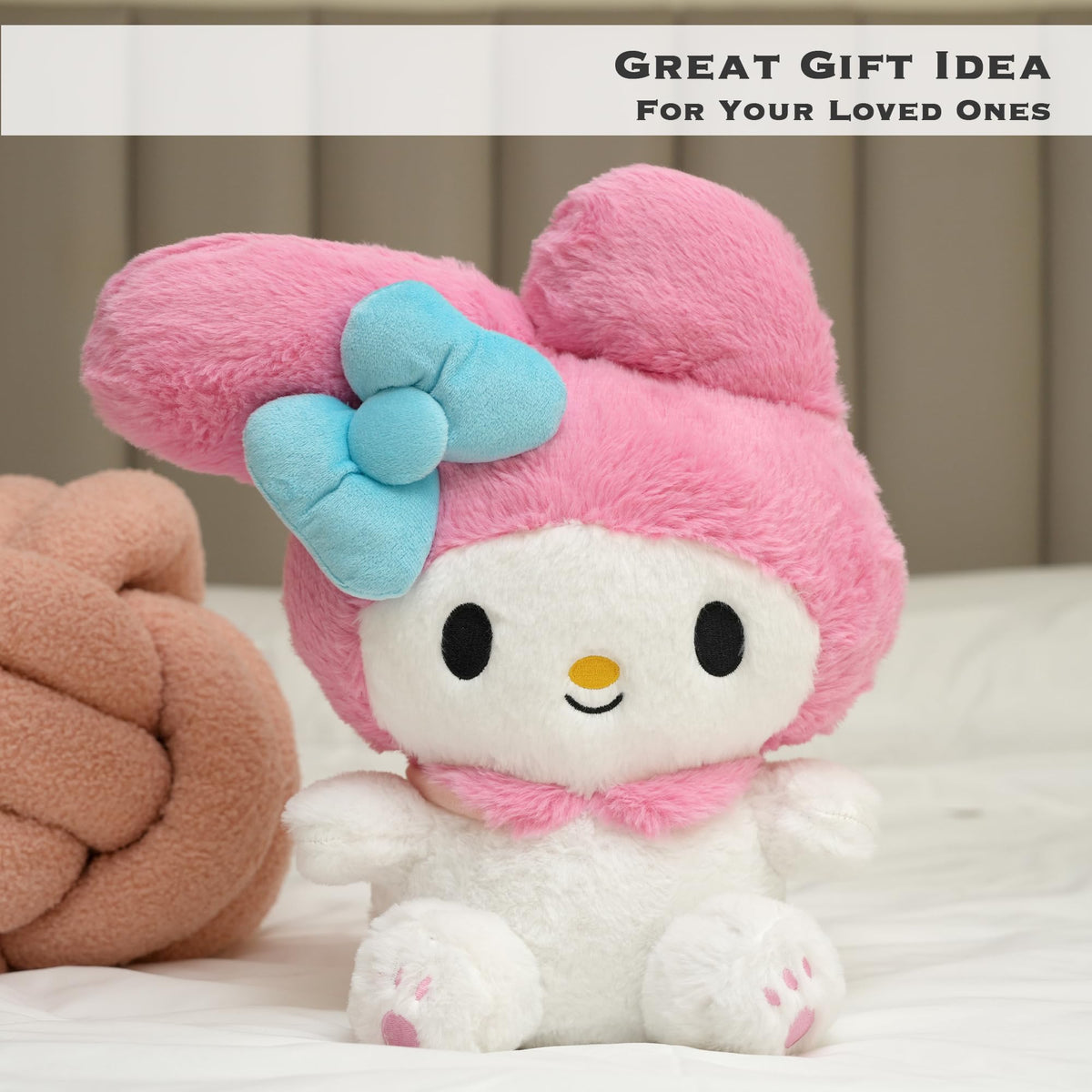 Juju Goods pink kawaii plush cuddly companion for kids and adults.