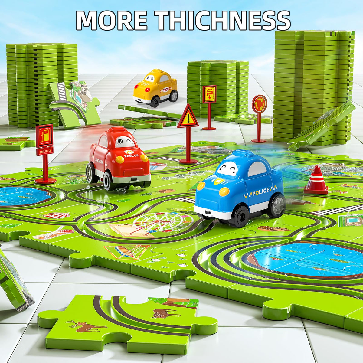 JUKUDAHU city-themed track setup shown in a bright playroom.
