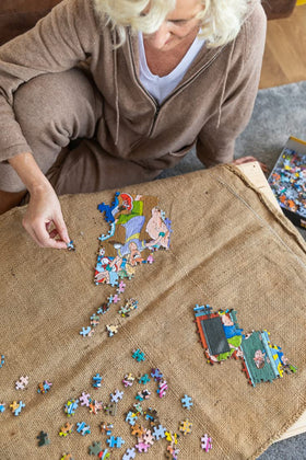 Jumbo Wasgij Retro Mystery 19 puzzle pieces spread for solo play