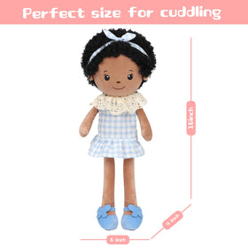Jumbrace doll in blue gingham dress showcases vintage charm for pretend play.