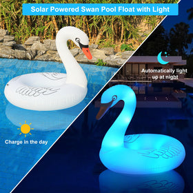 Junbig Swan pool float LED color-changing lights at dusk