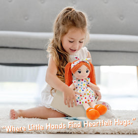 June Garden Bella dress with colorful polka dots adds playful style during pretend play.