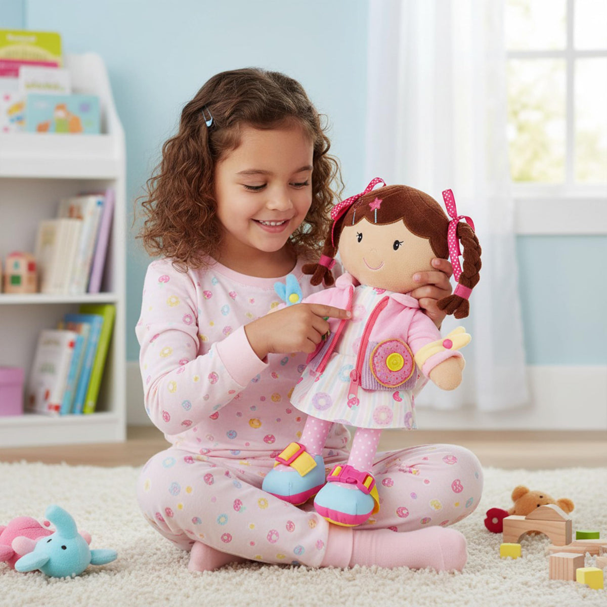 June Garden Dressy Friends Daisy demonstrates seven dressing skills through interactive play