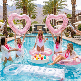 Junkin pool prop floats in sunlight brighten summer pool photos.