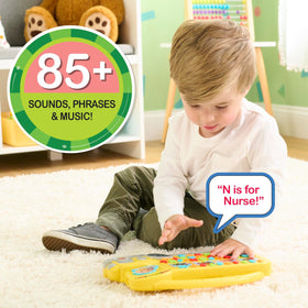 Just Play Cocomelon Learning Bus built-in carrying handle for on-the-go play sessions.