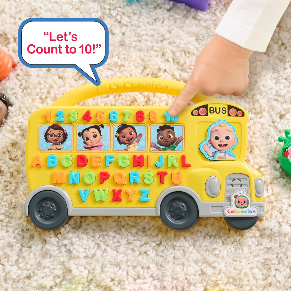 Just Play Cocomelon Learning Bus side view highlighting the 37 buttons for letters and numbers.