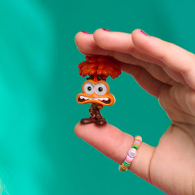 Just Play Disney Doorables Inside Out 2 Anger figure with bold colors, great for display and gifting