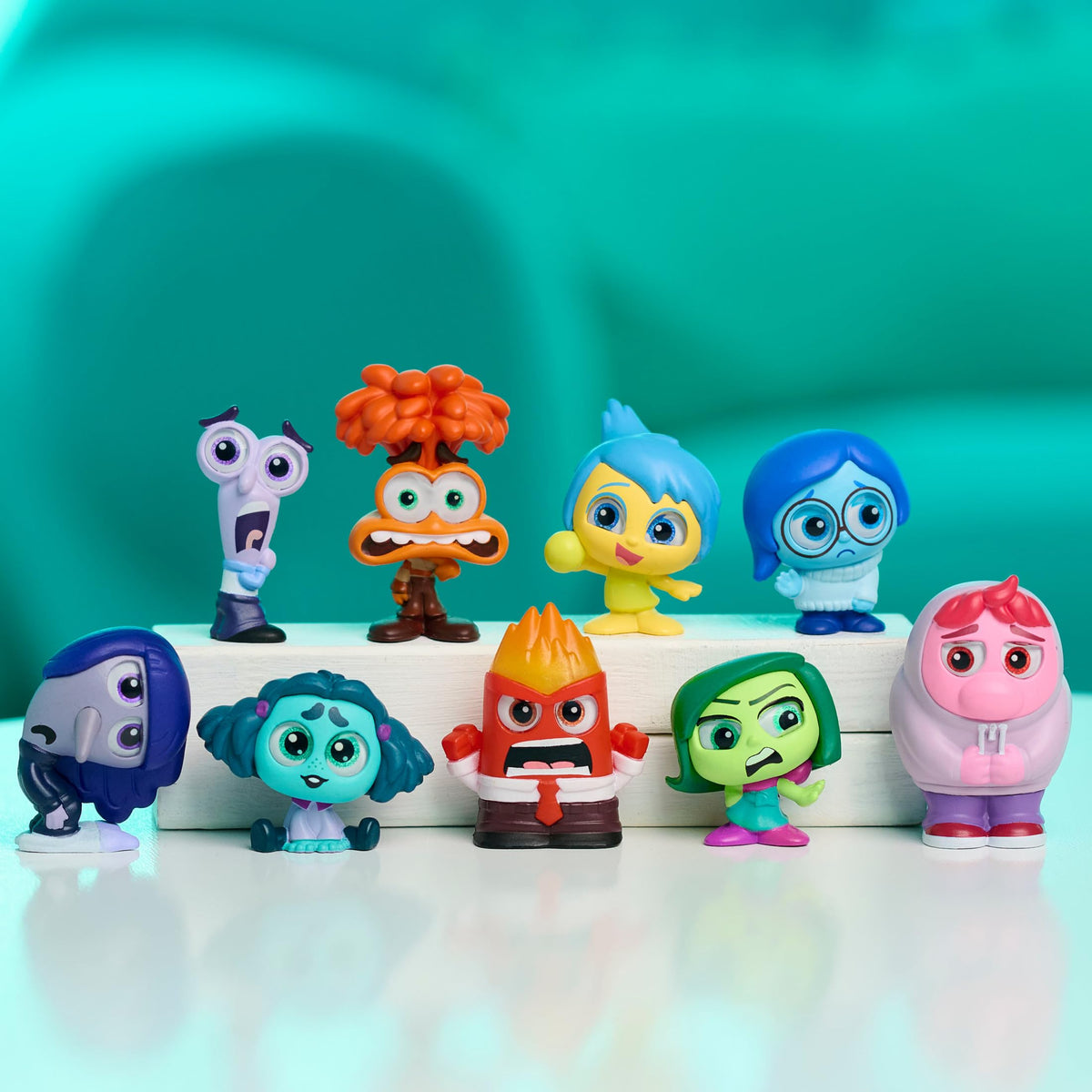 Just Play Disney Doorables Inside Out 2 Sadness figure with sparkly eyes, perfect for display or sharing